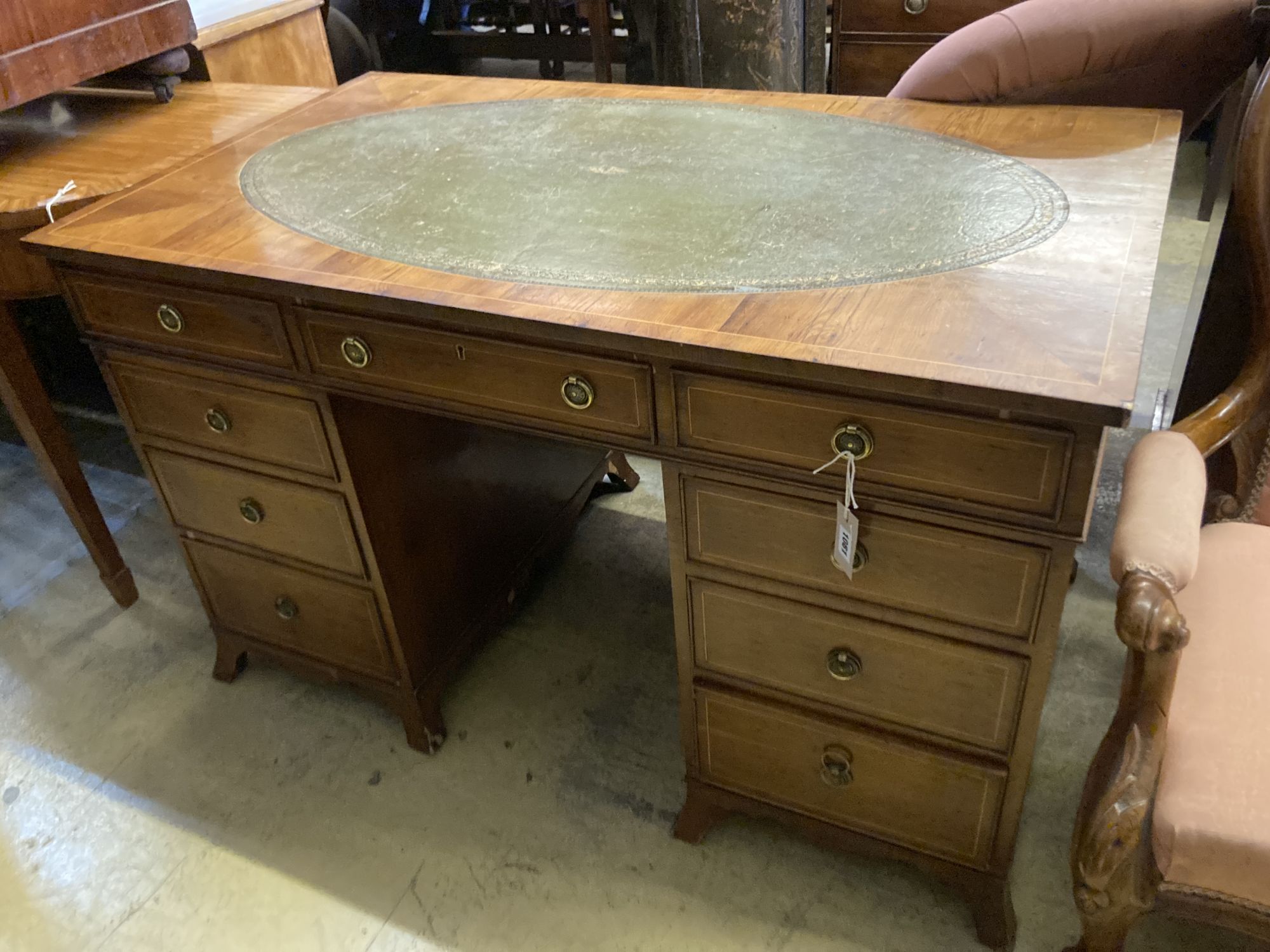 A George III style yew pedestal desk, length 122cm, depth 69cm, height 74cm